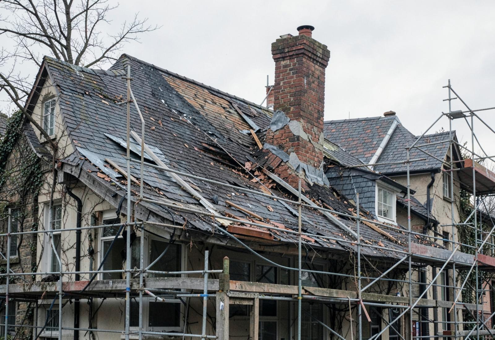 A house roof being repaired